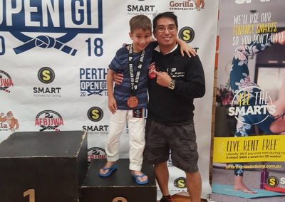 champion kid with his trainer